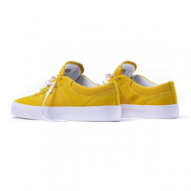 tenis hocks amarelo queimado